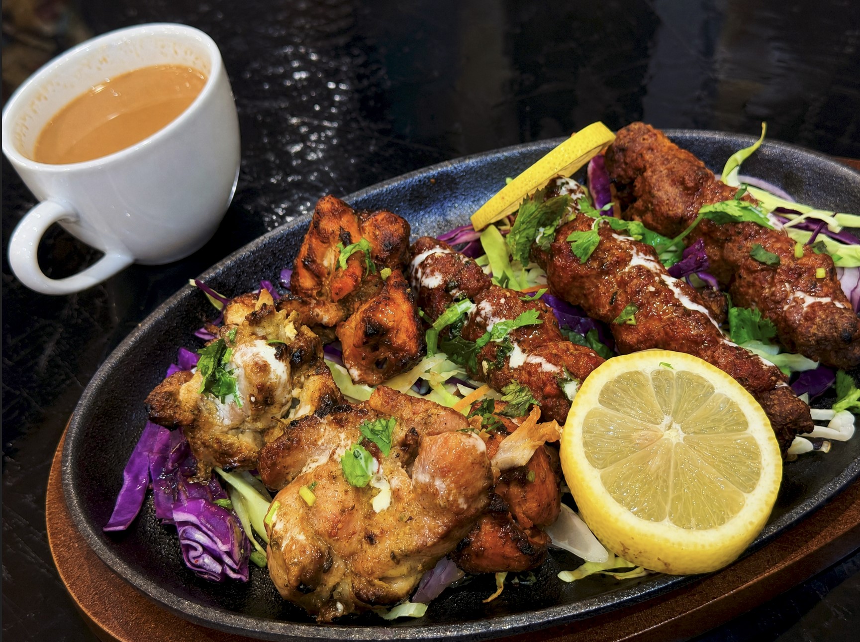 Mixed grill platter with seekh kebab, chicken tikka and tandoor specialties at Tandoor and Chai Bedford Perth